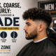 A barber gives a fade haircut to a man with curly hair, illustrating how to choose the right fade for thick, coarse, or curly hair. MEN ZONE Barbershop branding is visible.